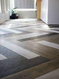 The unique wood look featuring strips of a mixed oak species visual combined with highlights of driftwood are perfect for. Oh Yes She Diyd Herringbone Floors With Vinyl Stick Down Planks Lila Is A Wolff Diy Flooring Herringbone Floor Flooring