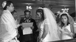 The Rabbi Reads From The Ketuba As Part Of This Traditional Wedding Ceremony In Mumbai Formerly B Wedding Officiant Jewish Wedding Wedding Ceremony Traditions