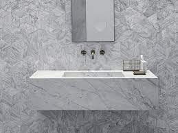 The wall hung sink can accompany any bathroom setting. Rectangular Wall Mounted Marble Washbasin Stiletto By Salvatori