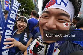 Licensable picture: Japan fans celebrate World Cup victory over Tunisia in Tokyo