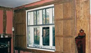 Sunburst shutters offers sliding barn doors for your door and window treatment needs. Historic Window Shutters