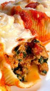 Classic Stuffed Shells With Italian Sausage Ground Beef Spinach Garlic And Herbs Stuffed In J Stuffed Shells Recipe Jumbo Shell Recipes Shell Pasta Recipes