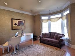 Piano Room With Wood Floor Crown Molding Recessed Lights And Bay Window Could Also Be Used As A Formal L Living Room Lighting Formal Living Rooms Front Room
