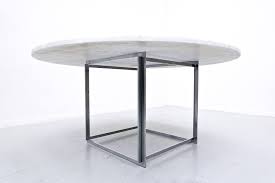 This oval coffee table's simple design lets the materials speak for themselves, and open shelving comes with endless decorating possibilities. Previous Next Dining Table Pk 54 By Poul Kjaerholm For E Kold Christensen 1963 Ref 1723789 H 65 Cm 25 59 W 140 Cm 55 12 Request For More Information Shipping Transport Shipping Transport Visit Us Rue Watteeu 19 1000 Brussels