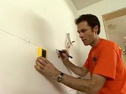 Pull the fish tape down, attach the cable and pull it up. How To Install Wall And Base Kitchen Cabinets How Tos Diy