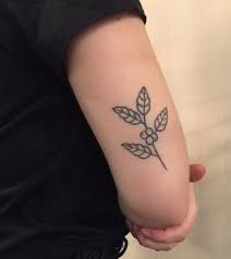 A tiny coffee bean tattoo on the palm looks cute on a young boy or a girl. The Coolest Coffee Tattoos