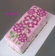 A rectangular cake is easier to divide into equally sized pieces. Pin On Ladies Cake Designs