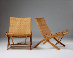 There are 703 wooden folding chairs for sale on etsy, and they cost $142.18 on average. Pair Of Folding Chairs By Hans J Wegner For Johannes Hansen Denmark 1949