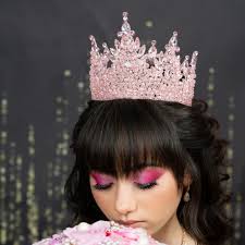 Moms with daughters with pink dresses (regular pink not hot pink) can you  show me what Tiaras you used and links if you have them? I am having a hard  time finding
