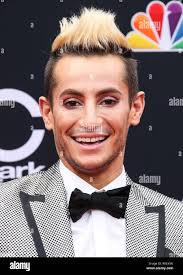 In this May 2018 photo, Frankie Roark discusses the death of his uncle Frank  Roark Jr. in his uncle's garage. His uncle Francis Roark Jr., 54, was found  dead Friday, May 11,