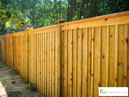 Like any other fence, this option is made of posts and rails. The King Board And Batten Wood Privacy Fence Pictures Per Foot Pricing Wood Privacy Fence Fence Design Privacy Fence Designs