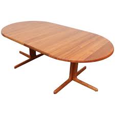 Maybe you would like to learn more about one of these? Danish Teak Round To Oval Dining Table With 2 Leaves At 1stdibs
