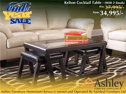 Our selection of coffee tables is among the largest on the internet which is why we recommend reaching out to one of our furniture specialists to help you make the right choice based on your personal style. Ashley Furniture Homestore Kenya On Twitter Kelton Coffee Table With Stools Sits Beautifully With Those Looking For Multi Functionality From Their Contemporary Furnishings Two Nesting Ottomans Upholstered In Faux Leather Provide Handy Informal
