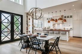 This lovely modern farmhouse kitchen by heidi caillier mixes metals, textures, and colors to create a sophisticated space that's very approachable. Living Room Open Concept Modern Farmhouse Kitchen