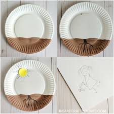 Paper plates, scissors, a stapler and a glue gun. Paper Plate Growing Flower Craft I Heart Crafty Things