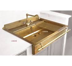 I'm assuming it's glued or rusted or painted into place. Pin By Tom Balamaci On Kitchens Brass Kitchen Sink Brass Kitchen Gold Kitchen