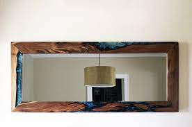 We use driftwood, twisted juniper, cedar, and root systems as bases in our home decor. Live Edge Walnut Mirror Large Abodeacious