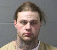 Malin woman accused in murder for hire