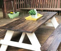 This lightweight table folds down to the size of a suitcase so that you can bring it with you on the go.it seats up to four individuals making it a great choice for outdoor outings with family and friends.made from. Picnic Table Diy Diy Picnic Table Wooden Picnic Tables Farmhouse Picnic Table