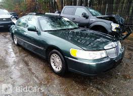 Image result for Charcoal Green 1999 Town Car