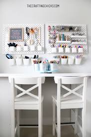 A home office & crafting room for a graphic designer is dominated by a unique lighting fixture. Craft Room Design The Crafting Chicks