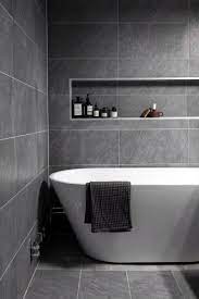 This black, white and grey modern bathroom is far from the boring stereotype of modern minimalist designs. Top 60 Best Grey Bathroom Tile Ideas Neutral Interior Designs