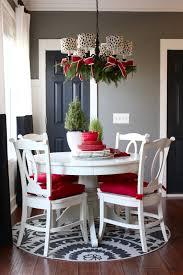 How To Decorate Your Chandelier For Christmas Holiday Chandelier Christmas Dining Table Decor Christmas Dining Room Decor Christmas Dining Table