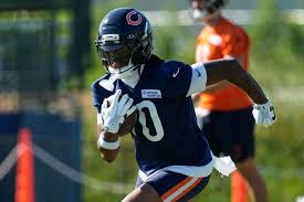 Bearing down: Bush finishes Bears practice with big collision
