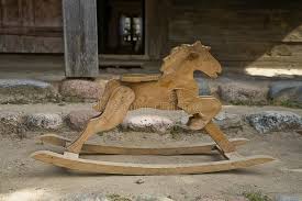 Antique rock horse vintage wooden rocking horse toy for kids, old children woode. L Small Antique Wooden Rocking Horse In Front Of A Wooden Cottage In A Close Up Stock Photo Image Of Vintage Horse 165331994