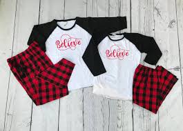Black And White Buffalo Plaid Christmas Pajamas Believe Buffalo Plaid Christmas Pajama Set Youth And Adult Red And Black Buffalo Pants Holiday Pajama Sets Cheerleader Pajamas Holiday Pajamas Christmas Pajamas Pajama Set