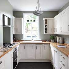 A mix of vintage brass handles, some from an old ship, keep the magpie vibe going. Home Living Blog Sage Green Walls Cream Kitchen