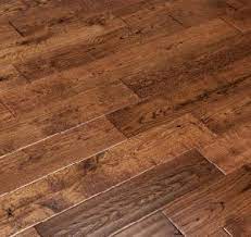 This makes the grain protrude slightly, so take extra care to ensure that the floor is clean. China Hand Scraped Mocha Oak Hardwood Flooring 5 X 3 4 China Oak Timber Flooring Solid Oak Flooring