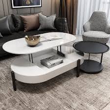 A glass coffee table makes for an elegant, subtle addition to the room, while a coffee table with storage is perfect for creating space for a striking centerpiece. Lift Top Storage Coffee Table And Side Table Set Modern Oval Coffee Table White And Black