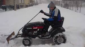 Attach wheel weights to the rear wheels of the mower to provide better tire traction. Using Your Riding Mower For Clearing Snow Lawneq Blog