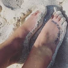 One thing's certain, this foot tattoos idea is a masterpiece with the quote written in exquisite writing and birds fluttering up high. Impressive Quote Tattoo On Foot Blurmark