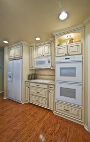 off white kitchen cabinets with wall