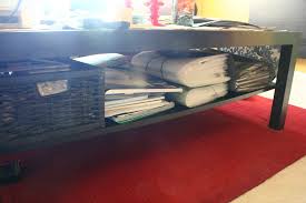 While most coffee tables feature some sort of storage compartment under their tops or to the side, this one adds to that a new function. Coffee Table Before The Storage Cubes Learn More About My Flickr