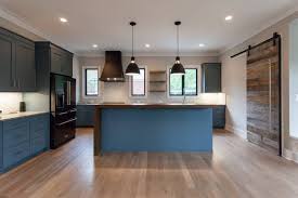 Contemporary Modern Kitchen With Slate Blue Cabinets And Reclaimed Wood Bar Counter And Black Appli Blue Kitchen Decor Kitchen Design Diy Wood Kitchen Cabinets