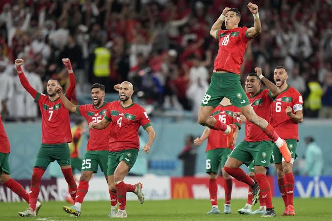 The Atlas Lions celebrating their emotional victory over the Netherlands., AI generated