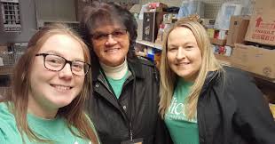 Staff from our Gaylord branch volunteered at the Otsego County Food Pantry  where they packed boxes and greeted families as they arrived to pick up  food. The report is that our volunteers