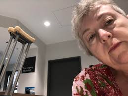 Knee surgery recovery with a companion corgi