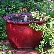 Adding a solar fountain pump to your pond can make it have a lot more character. How To Make An Outdoor Fountain From A Pot Hunker Diy Garden Fountains Diy Fountain Diy Water Fountain