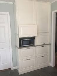 Brilliant Idea For Hidden But Easily Accessible Microwave Ikea Cabinet On Its Side With Hardware To Open Up From Ikd Ikea Cabinets Home Appliances Cabinet
