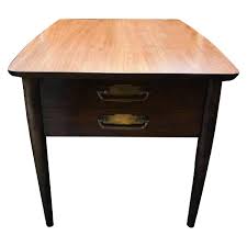 A rustic side table will have farmhouse charm with a distressed look and subdued design, adding a warm sense of comfort. Lane Vintage Mid Century Modern Side Table Aptdeco