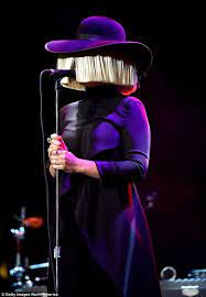 Sia Wears Her Beloved Blonde Wig And Hat Sia Aesthetic Sia Wallpapers Sia Singer