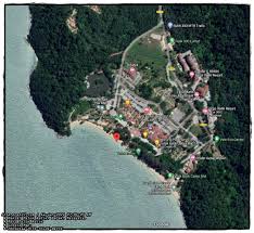 The beach is situated in a pleasant bay with headlands rising at each end, topped with jungle. Travelog Lumut Tf28