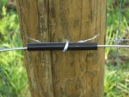 These electric fence insulator are beneficial and ideal for varied animal rearing. Tube Insulators Installed With A Staple Electric Fence For Cattle Electric Fence Farm Fence