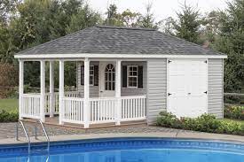 Design ideas for a traditional indoor rectangular lengths swimming pool in sussex with a water feature and tiled flooring. Colonial Pool House Small Pool House Designs