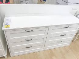 I finished the piece by taping off the front drawers with tape and adding a white border and a small white square around each of the knobs. Songesand 6 Drawer Dresser White 63 3 8x31 7 8 Ikea In 2021 Built In Dresser Build A Closet White Dresser