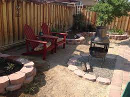 My Cozy Seat In The Backyard One Of My Favorite Spots I Will Be Putting Sand Down Around It For Beach Feel Backyard Cozy Seats Fire Pit Backyard